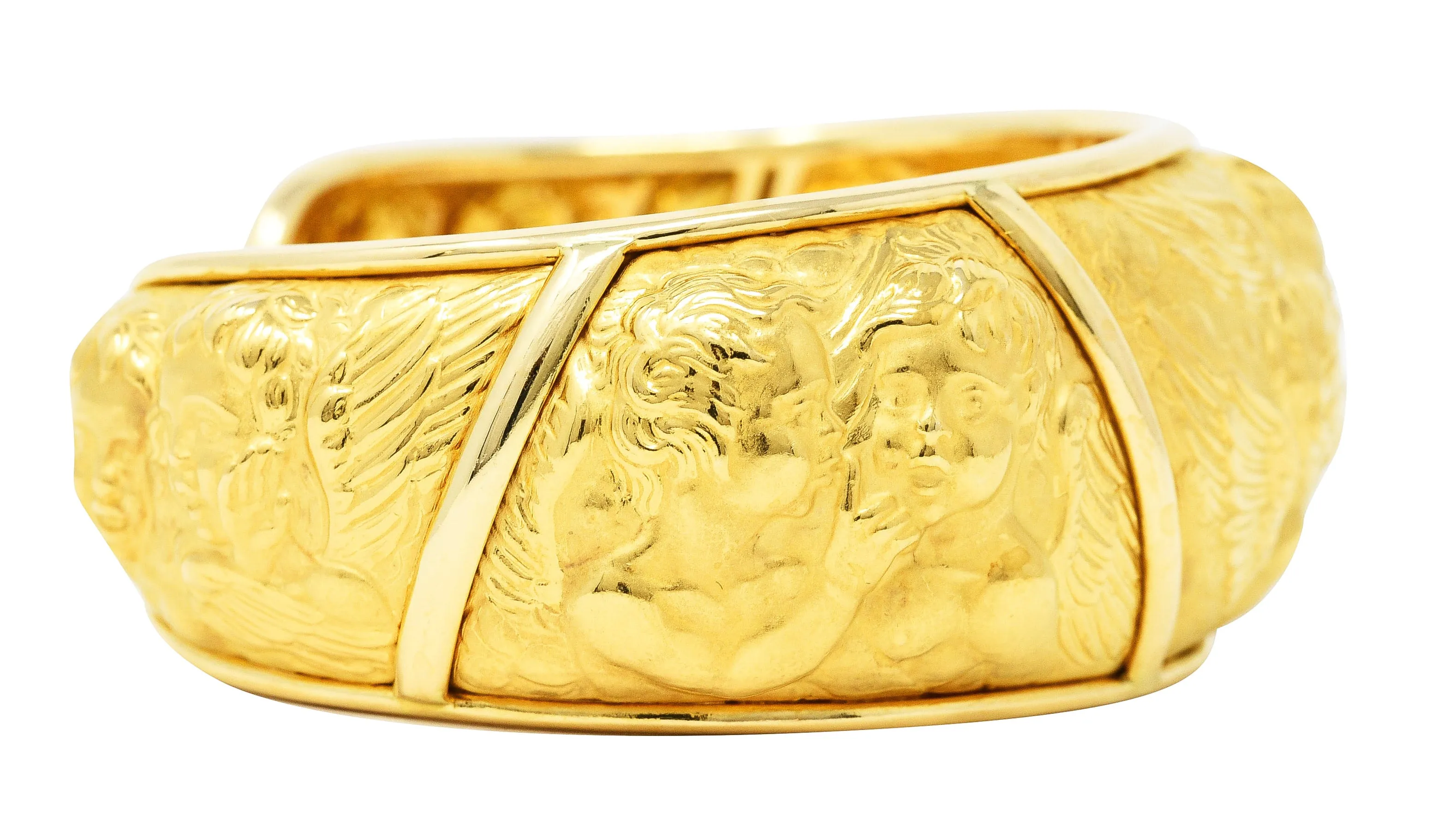 Carrera y Carrera 1990's 18 Karat Yellow Gold Repoussé Cherub Vintage Cuff Bracelet