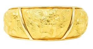 Carrera y Carrera 1990's 18 Karat Yellow Gold Repoussé Cherub Vintage Cuff Bracelet