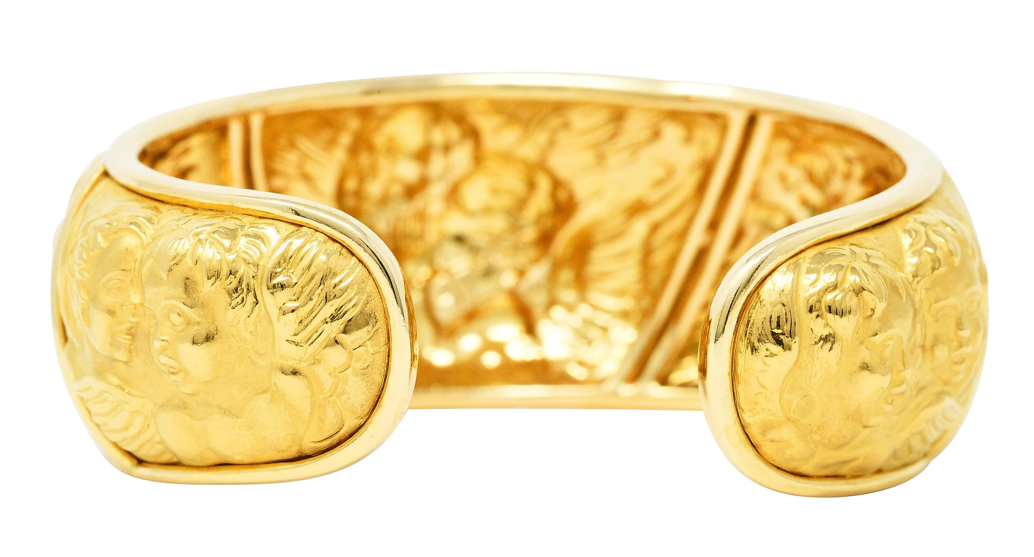 Carrera y Carrera 1990's 18 Karat Yellow Gold Repoussé Cherub Vintage Cuff Bracelet