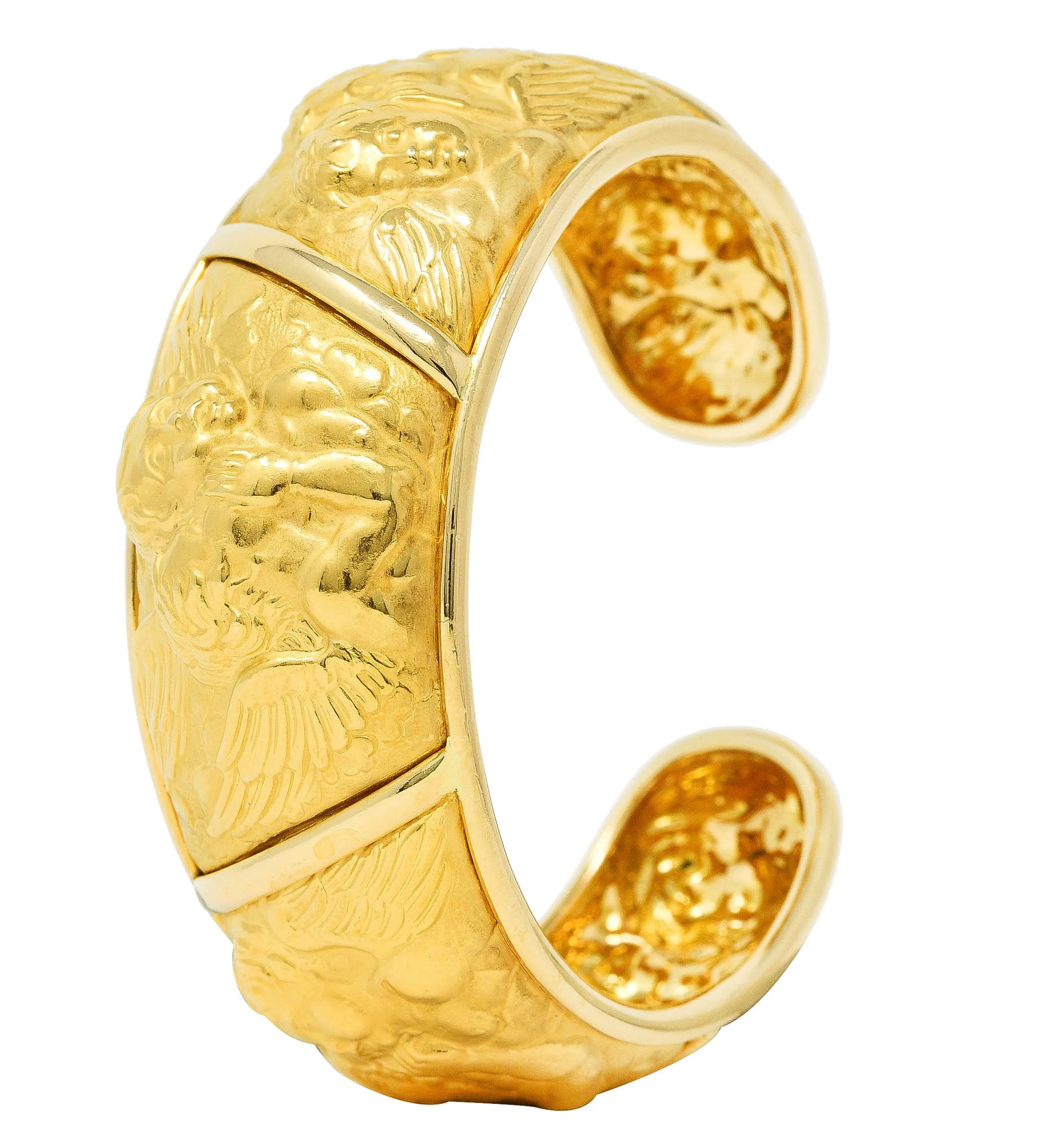 Carrera y Carrera 1990's 18 Karat Yellow Gold Repoussé Cherub Vintage Cuff Bracelet
