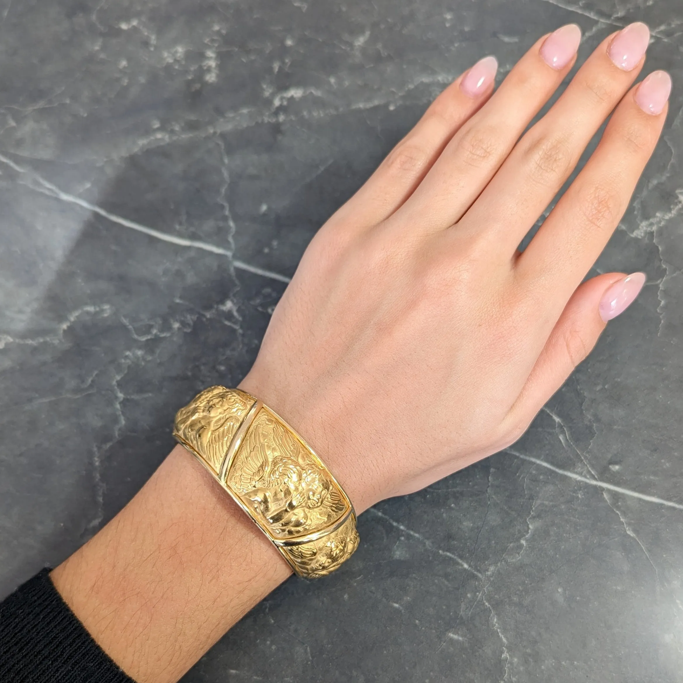 Carrera y Carrera 1990's 18 Karat Yellow Gold Repoussé Cherub Vintage Cuff Bracelet