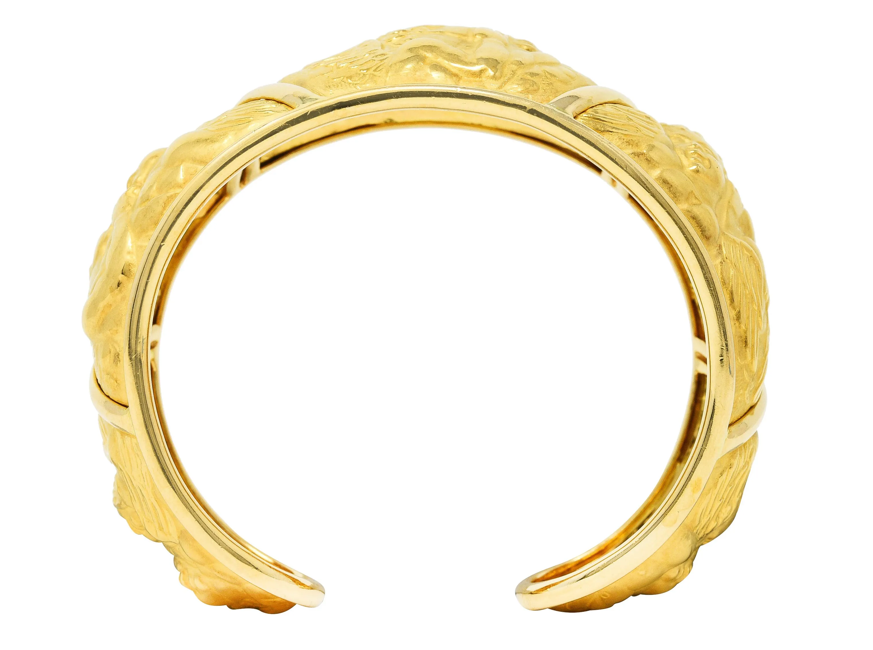 Carrera y Carrera 1990's 18 Karat Yellow Gold Repoussé Cherub Vintage Cuff Bracelet