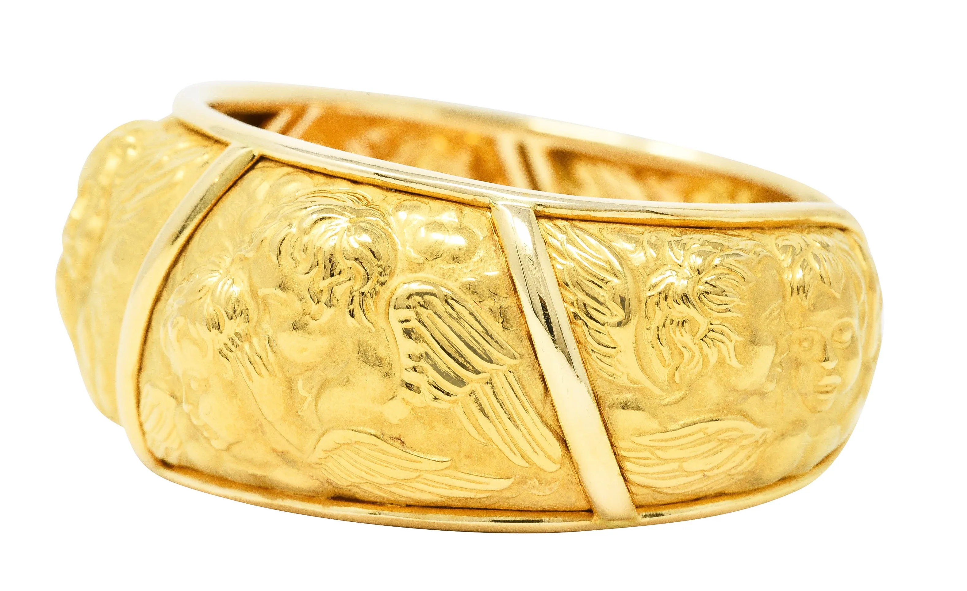 Carrera y Carrera 1990's 18 Karat Yellow Gold Repoussé Cherub Vintage Cuff Bracelet