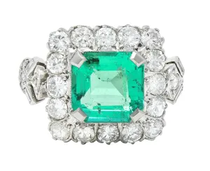 Mid-Century 5.73 CTW  Colombian Emerald Transitional Cut Diamond Platinum Vintage Halo Ring GIA