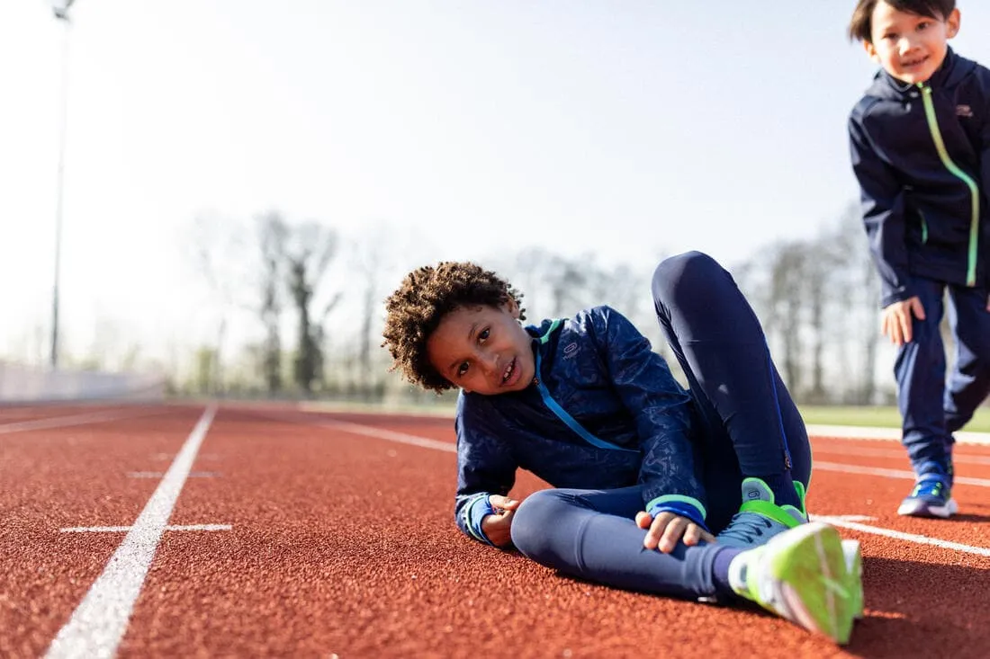 Veste coupe vent enfant pour l'athlétisme Kalenji AT 100 bleue